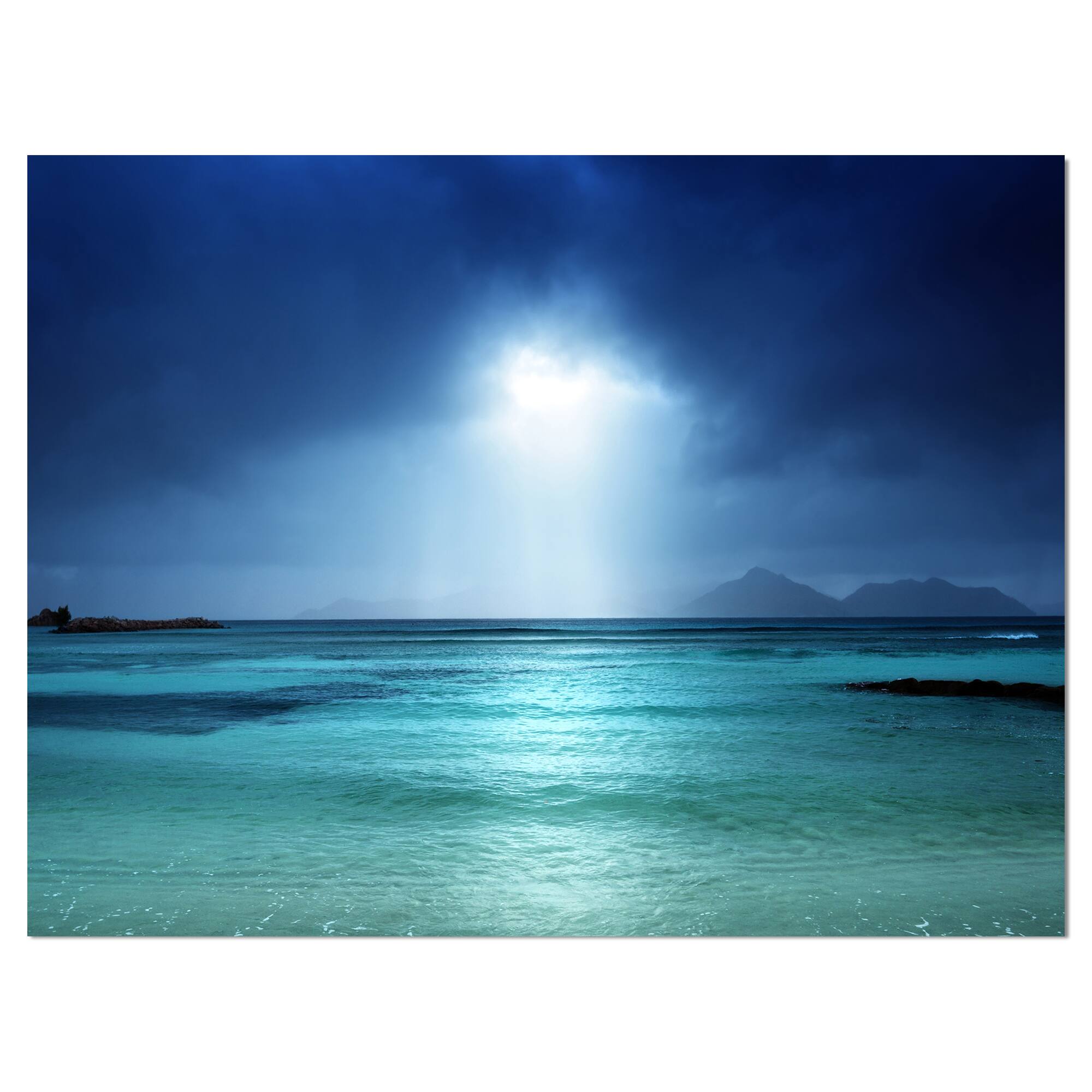 Designart - Blue sky on the beach of la Digue island Seychelles